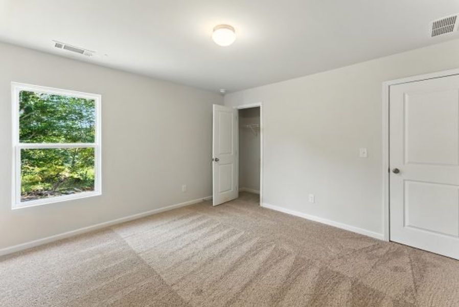 Representative unfurnished interior of a home built from the Brentwood by Piedmont Residential in Falls Creek, Flowery Branch (Image 26).