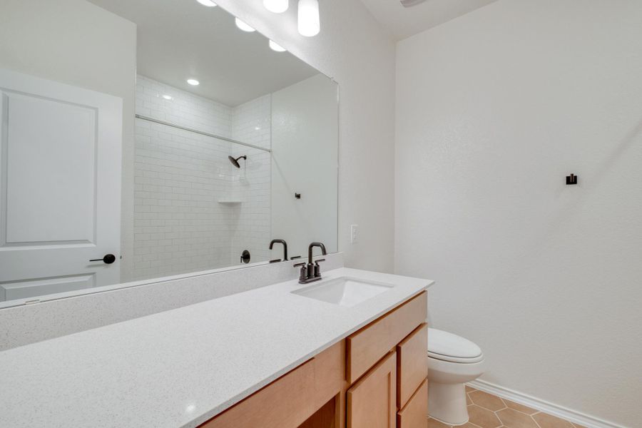 Furnished interior view inside a new home in Mustang Valley, Manor (Image 10).