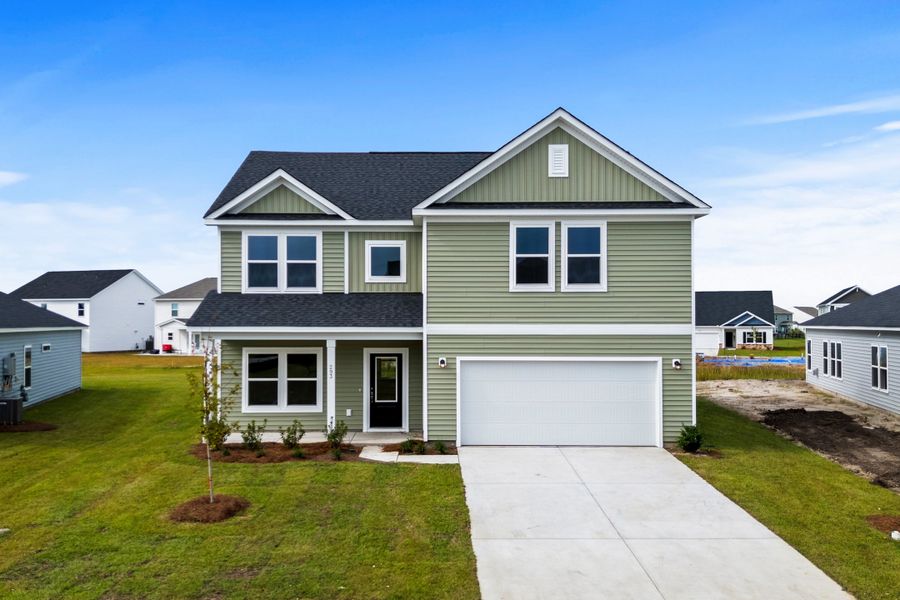 Representative exterior photo of a completed home built from the Monroe by Ashton Woods in Trieste at Bella Vita, Myrtle Beach, SC (Image 2).