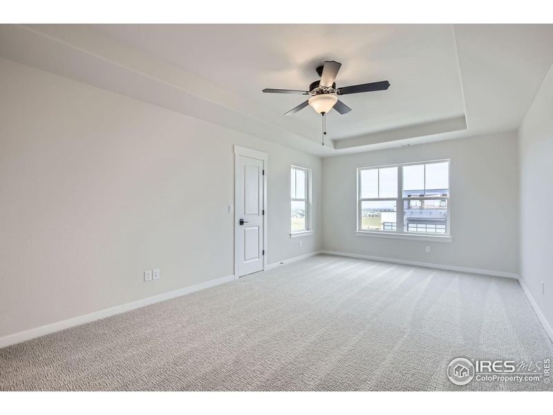 Spacious, unfurnished interior of a new home in RainDance National 60/70, Windsor (Image 24).