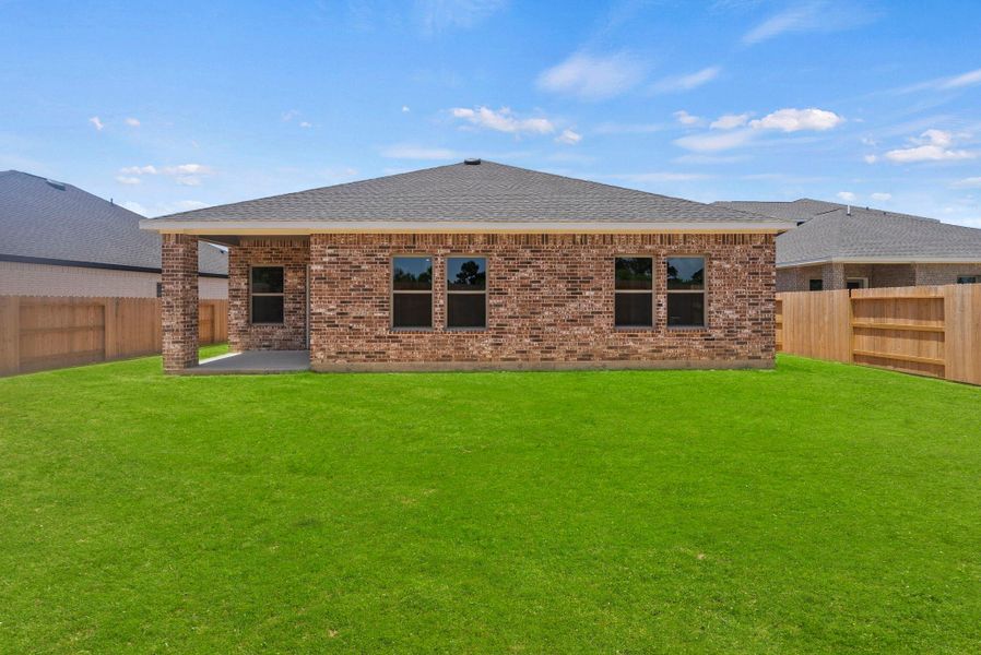 Exterior details and patio area of a home in Windcress, Cove (Image 24).