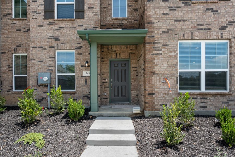 Exterior details and patio area of a home in Mockingbird Estates Townhomes, Fort Worth (Image 3).