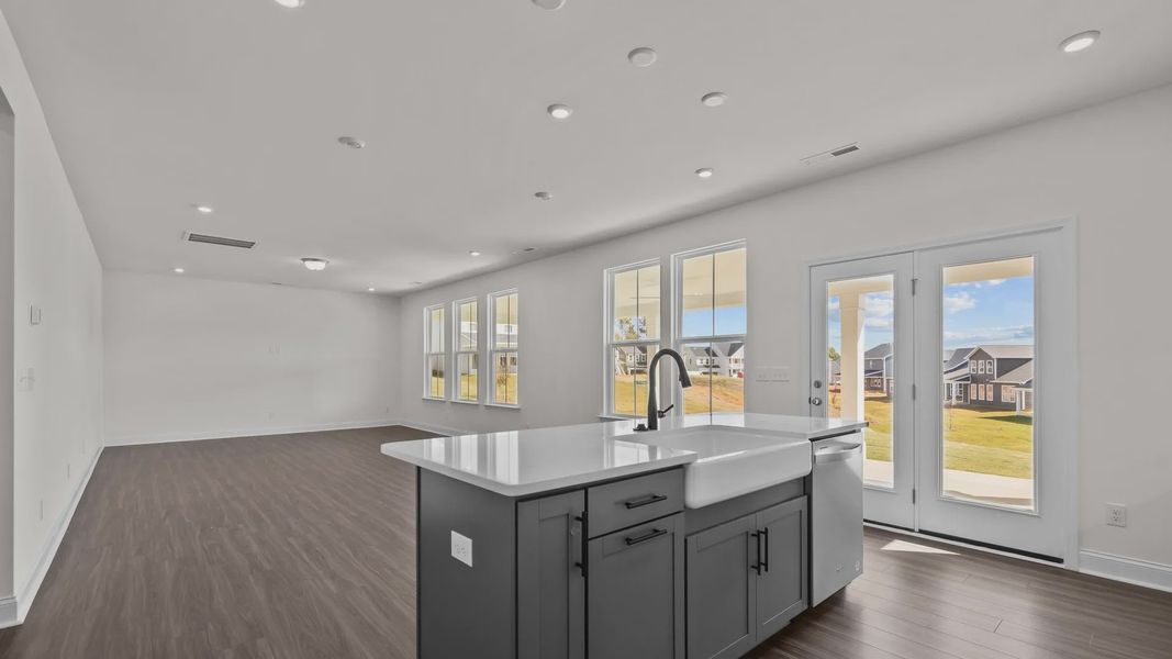 Burton Design open floor concept with plentiful windows for abundant natural light. At Lakeside Glen by DRB Homes, York, SC Burton Design open floor concept with plentiful windows for abundant natural light. At Lakeside Glen by DRB Homes, York, SC