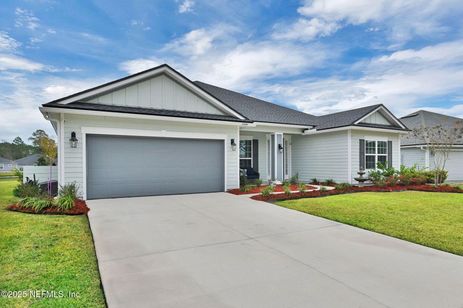 Front exterior of a new home in , Middleburg, FL, highlighting curb appeal (Image 22). Front exterior of a new home in , Middleburg, FL, highlighting curb appeal (Image 22).