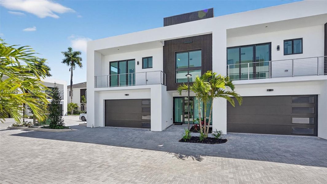 Front exterior of a new home in , Dania Beach, FL, highlighting curb appeal (Image 42).