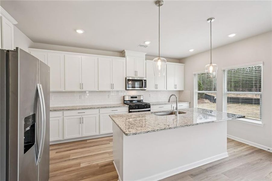 Furnished interior view inside a new home in Harmony Manor, Fairburn (Image 10).