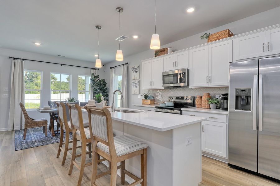 Representative furnished interior of a home built from the Lawrence - Genesis Value Collection by Mungo Homes in Fairway Woods at Wyboo, Manning (Image 3).