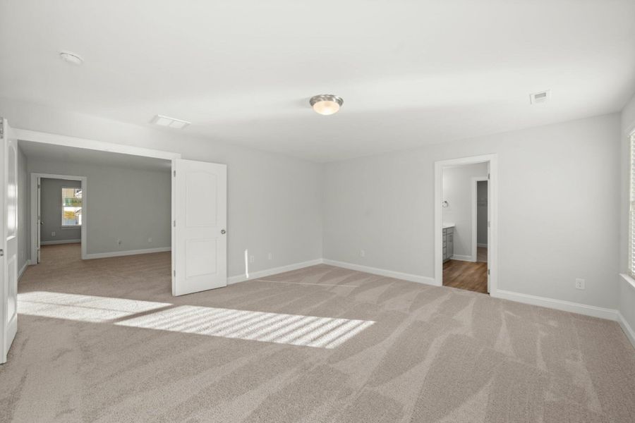 Spacious, unfurnished interior of a new home in Cottages at Piper Village, Trinity (Image 36).