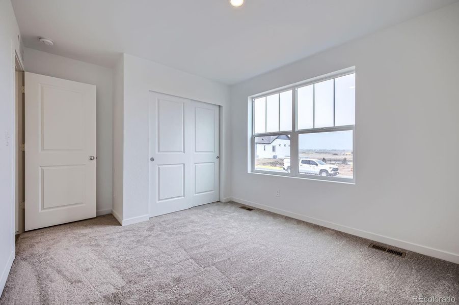 Spacious, unfurnished interior of a new home in Percheron: The Camden Collection, Colorado Springs (Image 5).