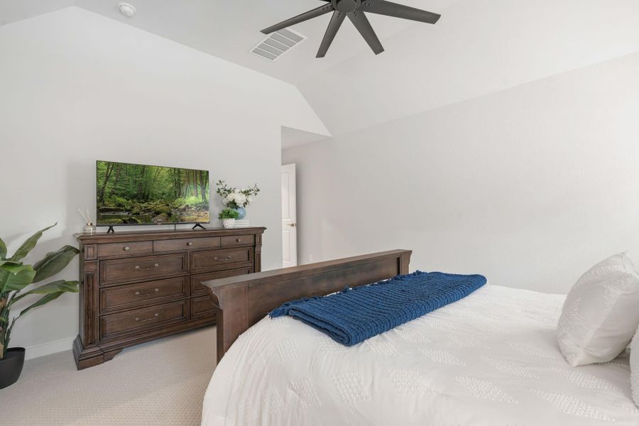 Another view of the primary bedroom