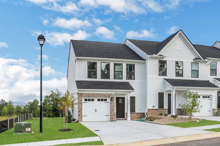 Front exterior of a new home in Laurel Fields, Gainesville, GA, highlighting curb appeal (Image 2).