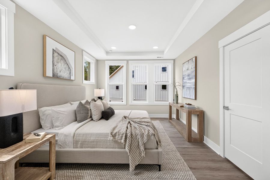 Representative furnished interior of a home built from the Weston End Unit by Baker Residential in Parc at Bradley Farm, Apex (Image 17).