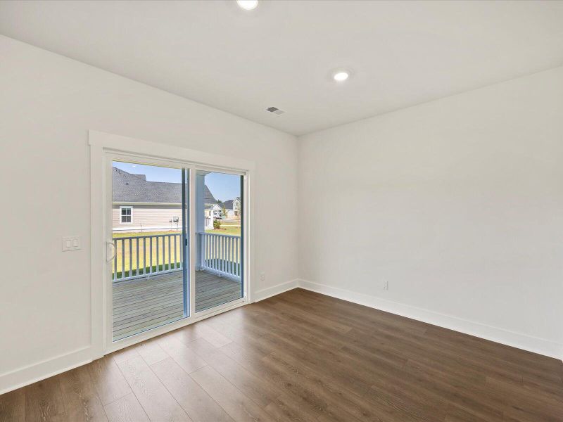 Spacious, unfurnished interior of a new home in The Coves at Lakes of Cane Bay, Summerville (Image 9). Spacious, unfurnished interior of a new home in The Coves at Lakes of Cane Bay, Summerville (Image 9).