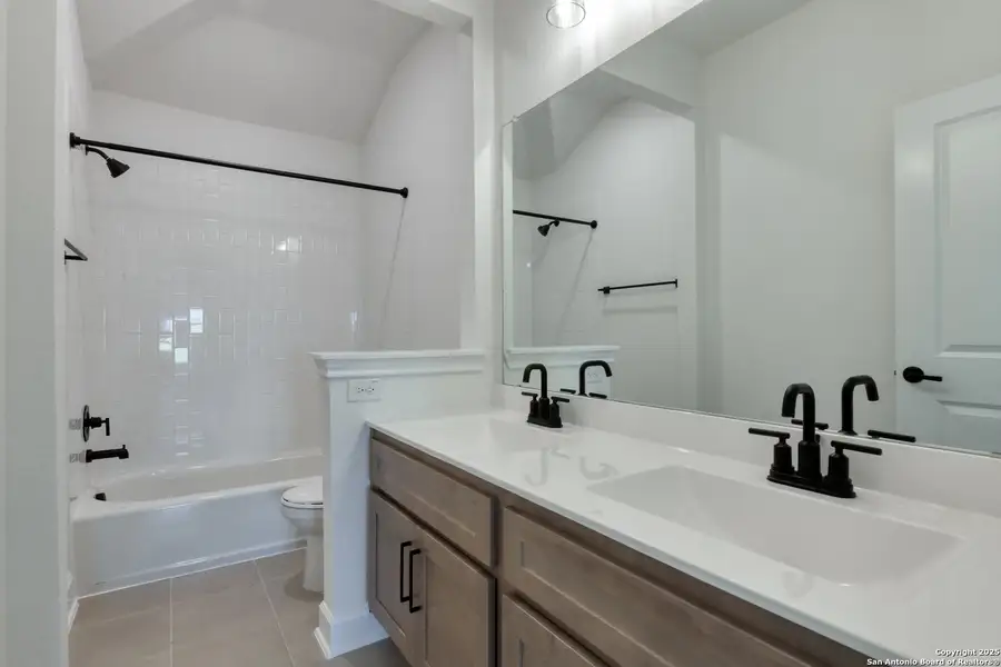 Furnished interior view inside a new home in Megan's Landing 70's, Castroville (Image 8).