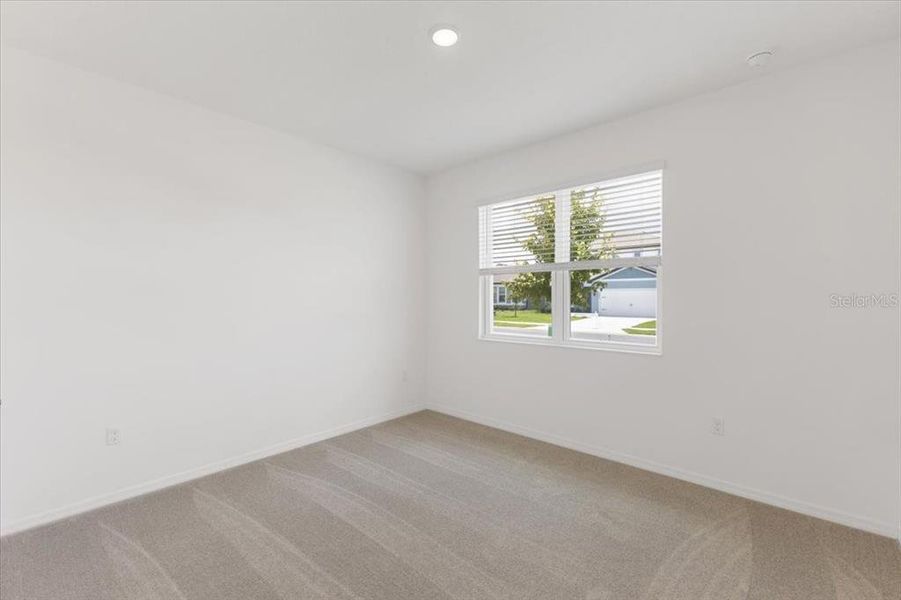 Spacious, unfurnished interior of a new home in Highfield at Twisted Oaks, Wildwood (Image 8).