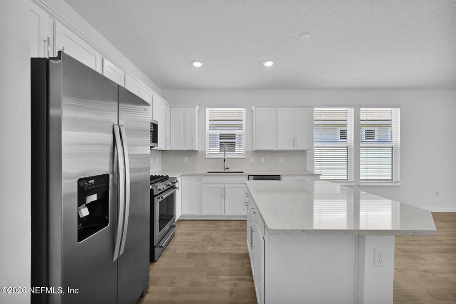 Furnished interior view inside a new home in Del Webb Wildlight, Yulee (Image 7).
