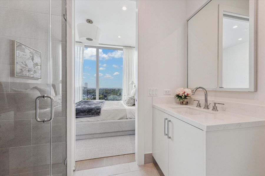 Second En-suite guest bathroom. Photos are of a similar unit with the same floor plan