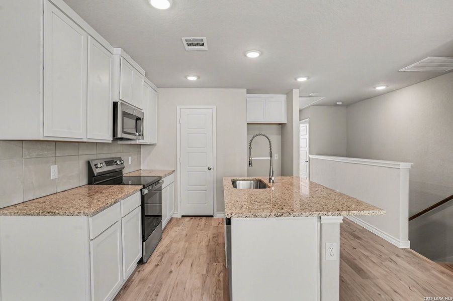 Furnished interior view inside a new home in , San Antonio (Image 10).