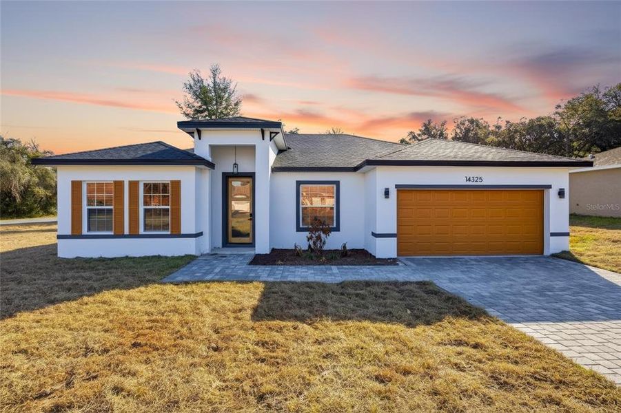 Front exterior of a new home in , Ocala, FL, highlighting curb appeal (Image 17). Front exterior of a new home in , Ocala, FL, highlighting curb appeal (Image 17).