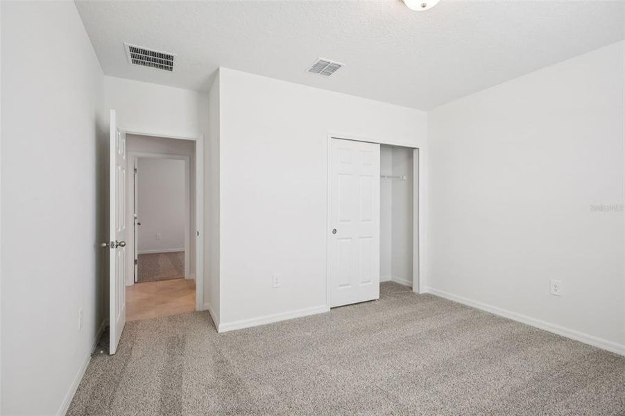 Spacious, unfurnished interior of a new home in Villamar - Signature Series, Winter Haven (Image 21).