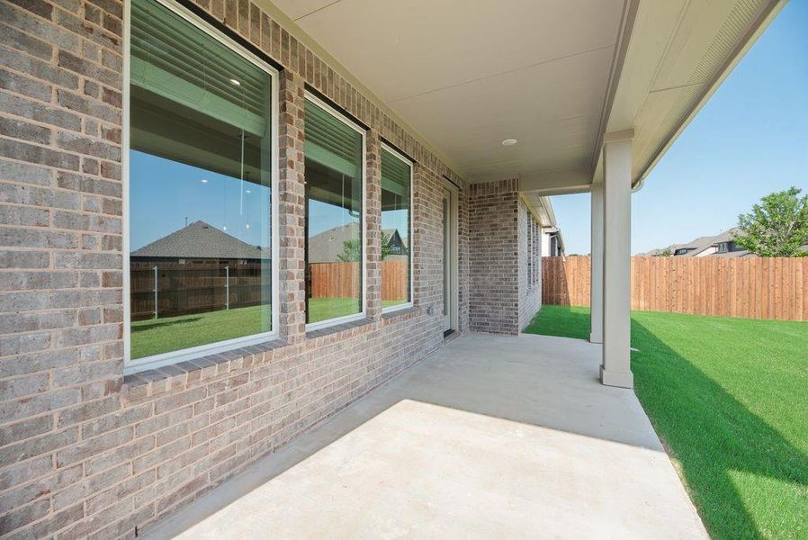 Exterior details and patio area of a home in Wildflower Ranch, Justin (Image 4). Exterior details and patio area of a home in Wildflower Ranch, Justin (Image 4).