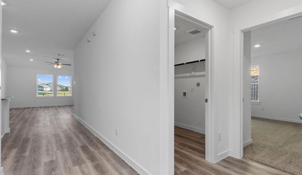 Representative unfurnished interior of a home built from the Cali by D.R. Horton in Caldwell Crossing, Iowa Colony (Image 16). Representative unfurnished interior of a home built from the Cali by D.R. Horton in Caldwell Crossing, Iowa Colony (Image 16).