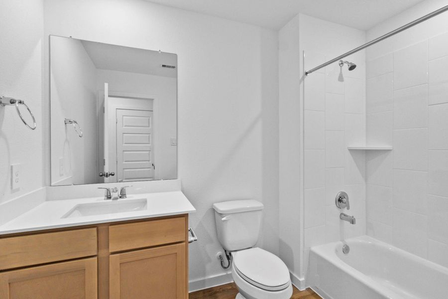 Furnished interior view inside a new home in Grand West, Houston (Image 8).