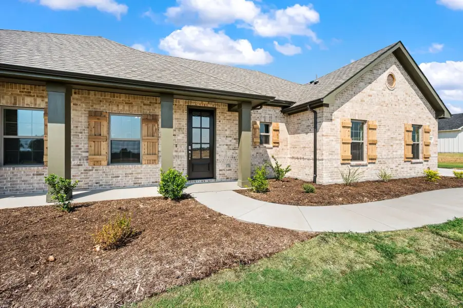 Exterior details and patio area of a home in Gatlin Ranch, Springtown (Image 3).