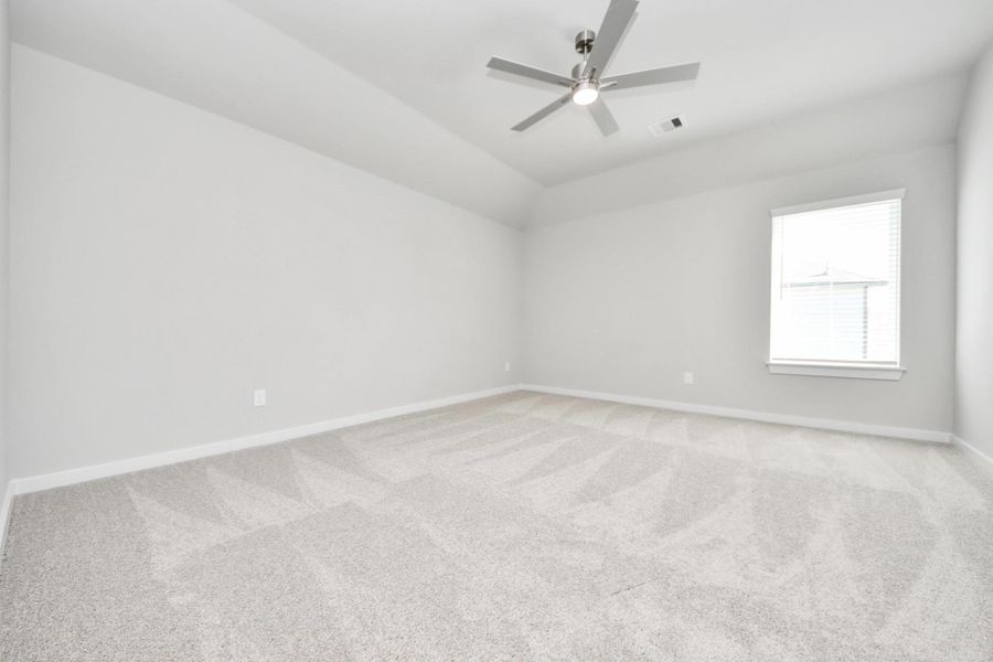 Come upstairs and enjoy a day of leisure in this fabulous game room! This is the perfect hangout spot or adult game room! Features plush carpet, high ceilings, custom paint and windows for plenty of natural light. Sample photo of completed home with similar floor plan. Actual colors and selections may vary.