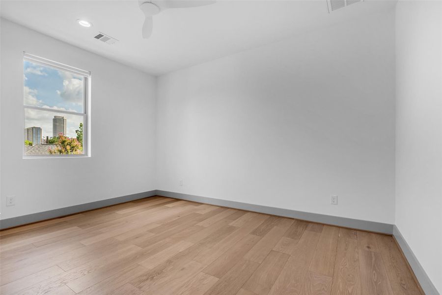 The third-floor bedroom provides a comfortable and versatile space that can be used as a guest bedroom, private retreat, or additional living area to suit your needs.