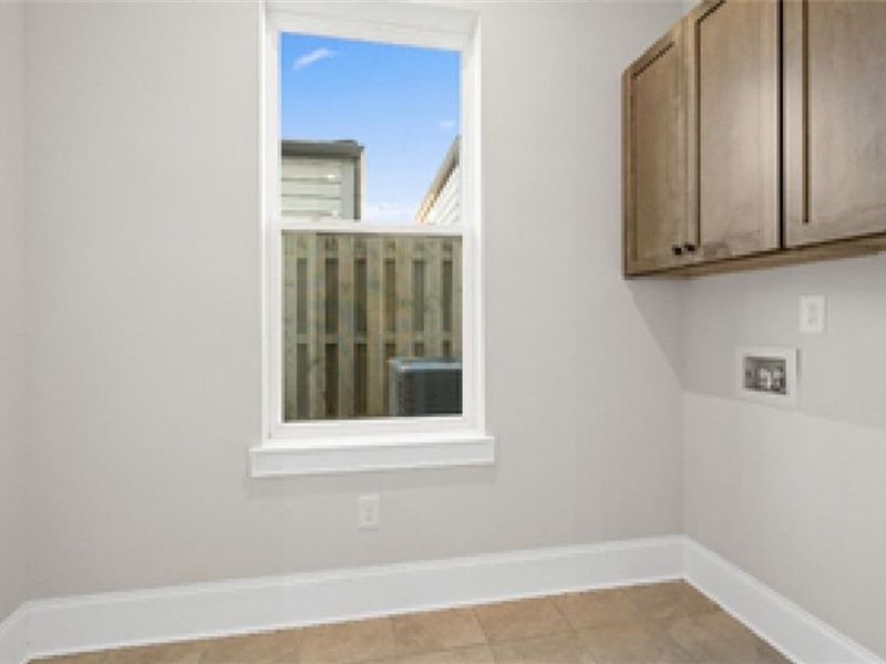 Spacious, unfurnished interior of a new home in The Village at Towne Lake, Woodstock (Image 35).