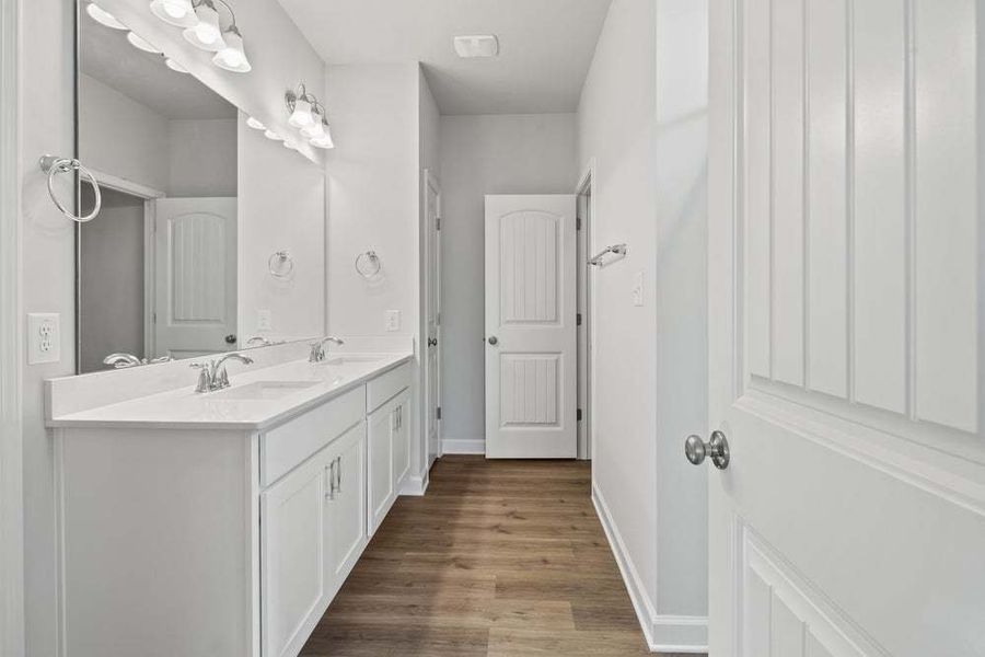 Representative furnished interior of a home built from the Camellia by Caviness & Cates Communities in Bartlett Manor, Youngsville (Image 23).