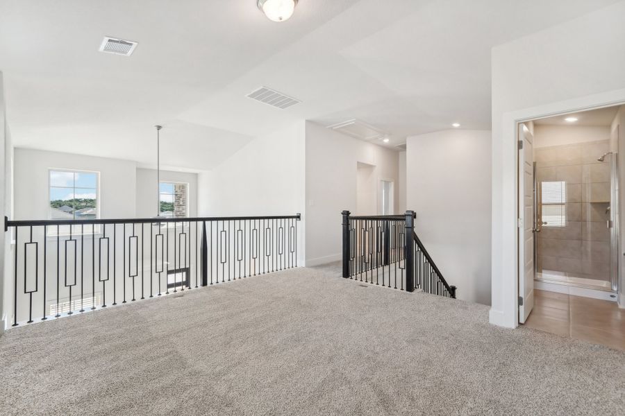 Second floor landing in the Medina floorplan at a Meritage Homes community.