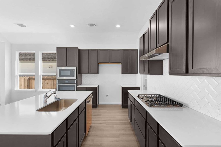 Furnished interior view inside a new home in Briarwood, Elgin (Image 5).