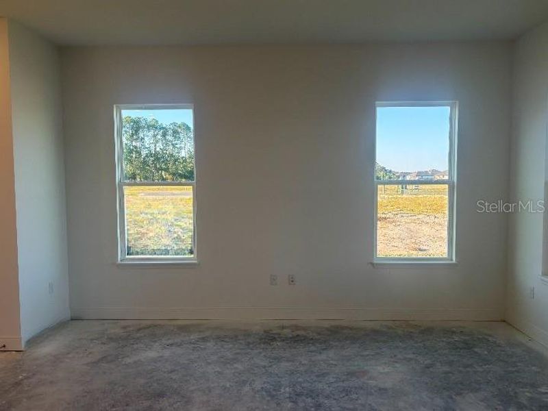 Spacious, unfurnished interior of a new home in Ardisia Park Estate, New Smyrna Beach (Image 33).
