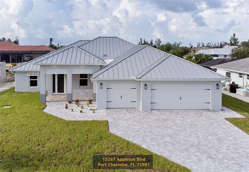 Front exterior of a new home in , Port Charlotte, FL, highlighting curb appeal (Image 1). Front exterior of a new home in , Port Charlotte, FL, highlighting curb appeal (Image 1).