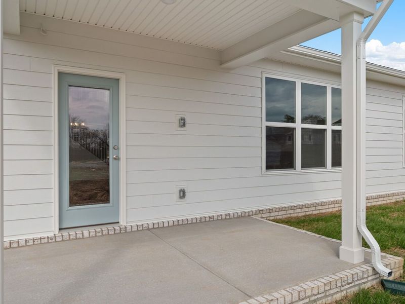 Exterior details and patio area of a home in Woods Crossing, Gallatin (Image 31).