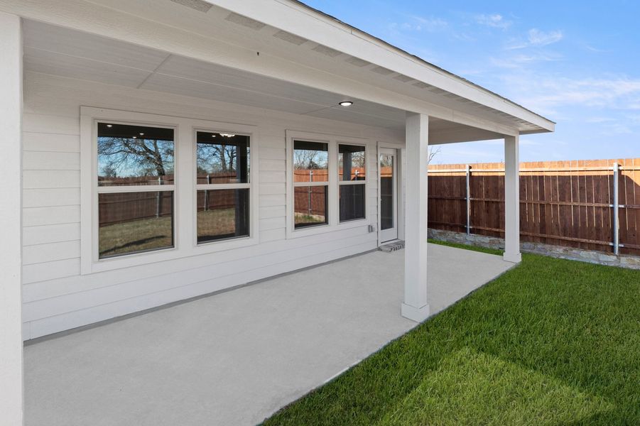 Front exterior of a new home in Belmont, Aubrey, TX, highlighting curb appeal (Image 28). Front exterior of a new home in Belmont, Aubrey, TX, highlighting curb appeal (Image 28).