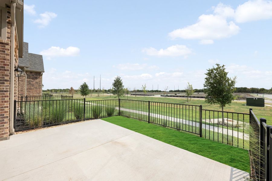 Exterior details and patio area of a home in Cottonwood Creek, Rowlett (Image 29).