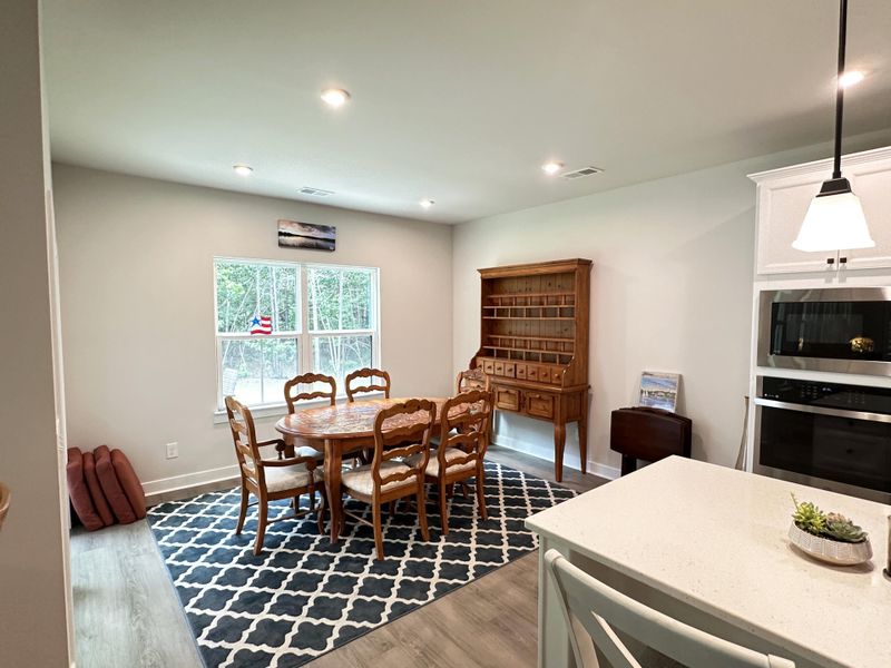 Furnished interior view inside a new home in , Awendaw (Image 46).