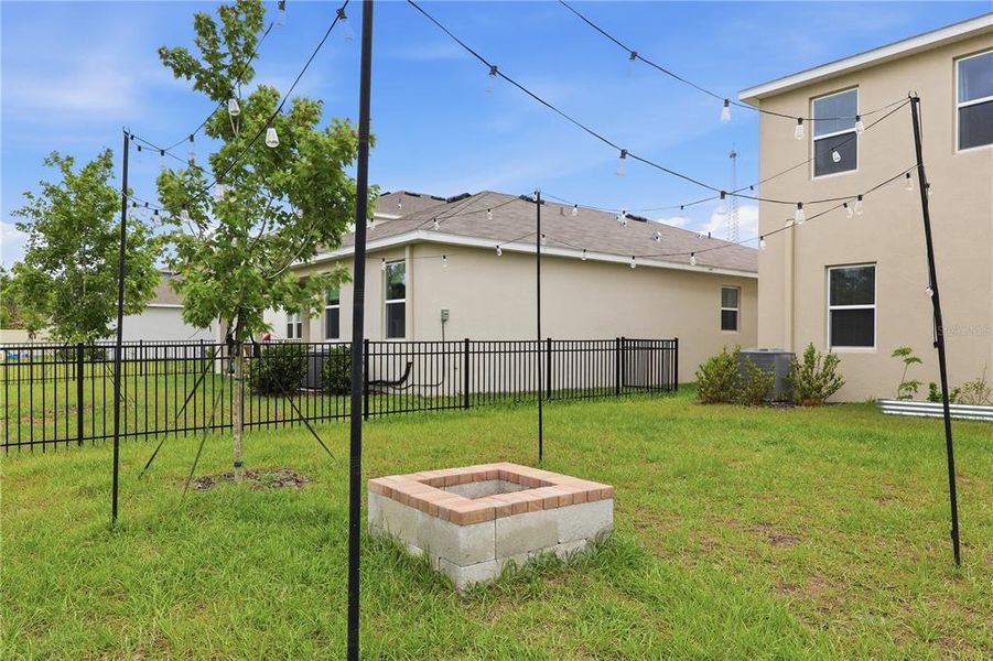 Exterior details and patio area of a home in Deerbrook, Land O' Lakes (Image 31).