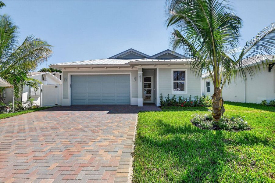 Front exterior of a new home in , Jupiter, FL, highlighting curb appeal (Image 22).