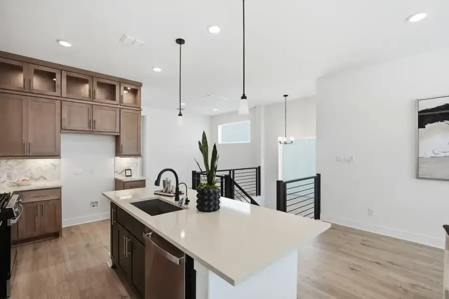 Representative furnished interior of a home built from the Calypso by Chesmar Homes in Centero at Stone Oak, San Antonio (Image 12).