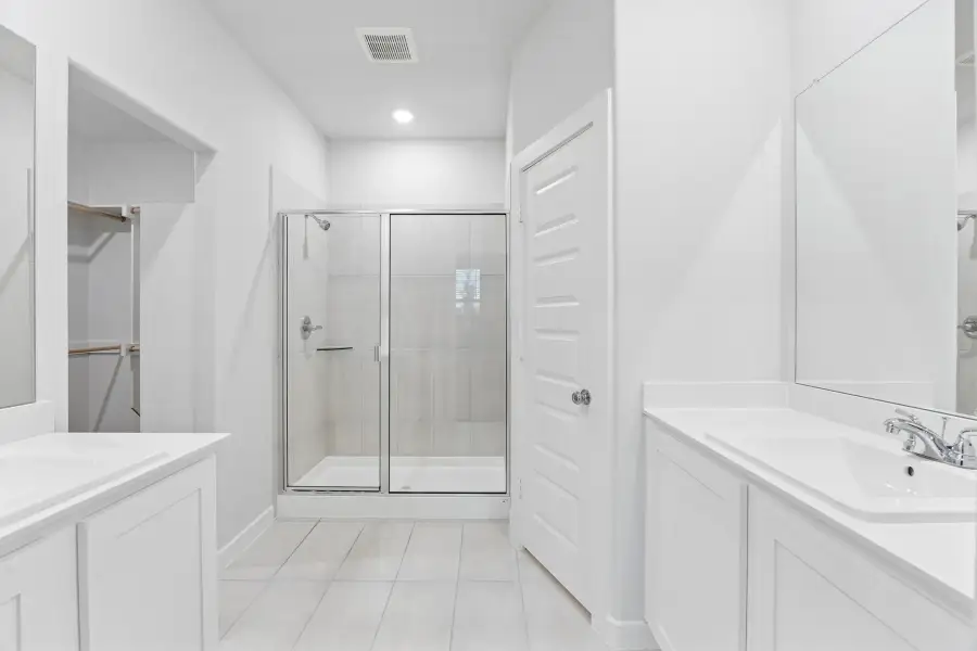 Primary Bathroom in the Cedar home plan by Trophy Signature Homes – REPRESENTATIVE PHOTO Primary Bathroom in the Cedar home plan by Trophy Signature Homes – REPRESENTATIVE PHOTO