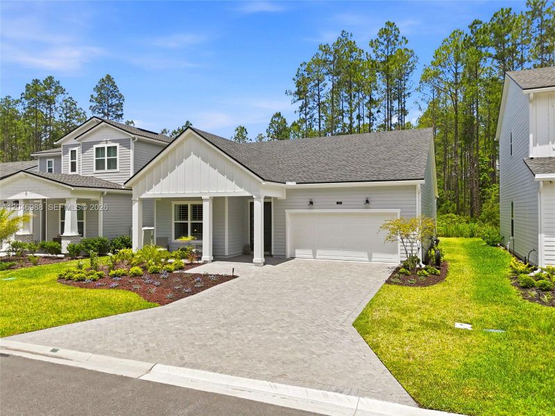 Front exterior of a new home in , St. Johns, FL, highlighting curb appeal (Image 25).