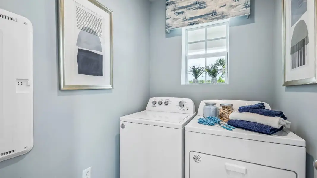 Representative furnished interior of a home built from the JEMISON by D.R. Horton in Asher Park, Lehigh Acres (Image 13).