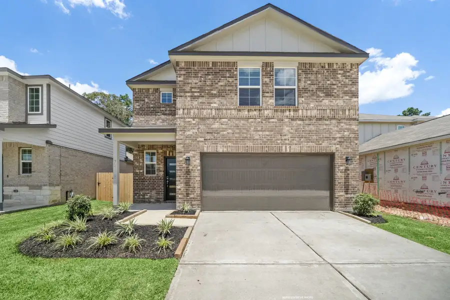 A house with a garage. A house with a garage.