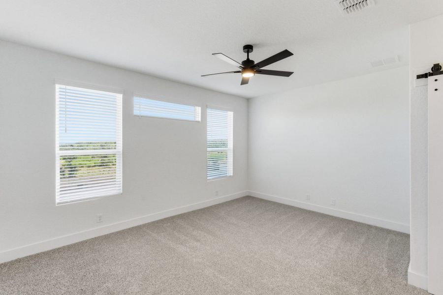 Spacious, unfurnished interior of a new home in Centero at Stone Oak, San Antonio (Image 15).