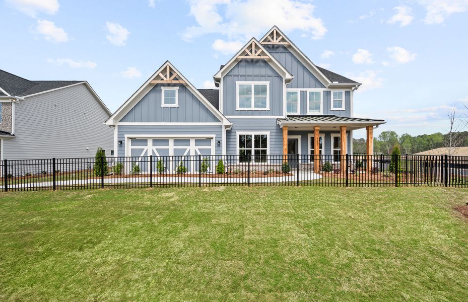 Front exterior of a new home in Oakwood, Cumming, GA, highlighting curb appeal (Image 26). Front exterior of a new home in Oakwood, Cumming, GA, highlighting curb appeal (Image 26).