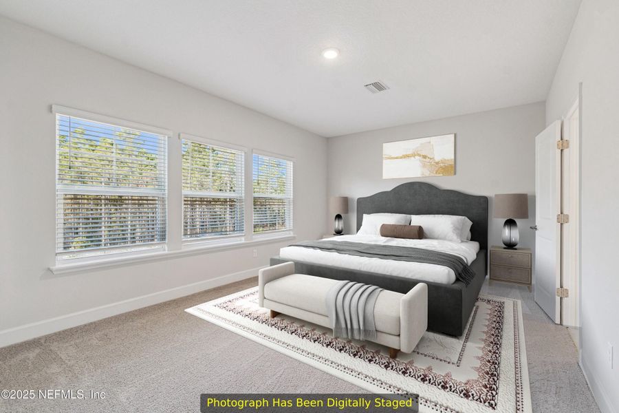 Furnished interior view inside a new home in Tributary 70', Yulee (Image 9).